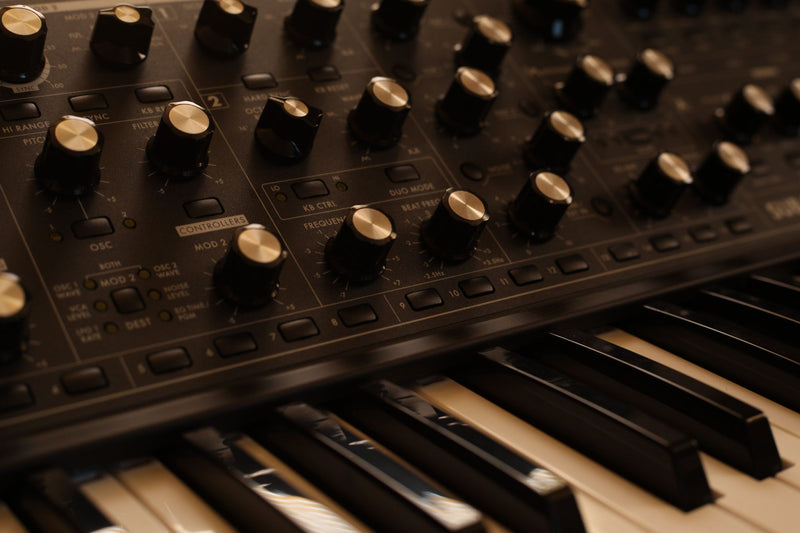 Commercial close-up of a polyphonic analog synthesizer keyboard
