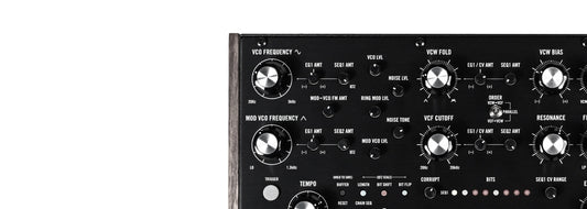 Close-up of analog synthesizer control panel showing knobs and buttons to buy synthesizers Toronto